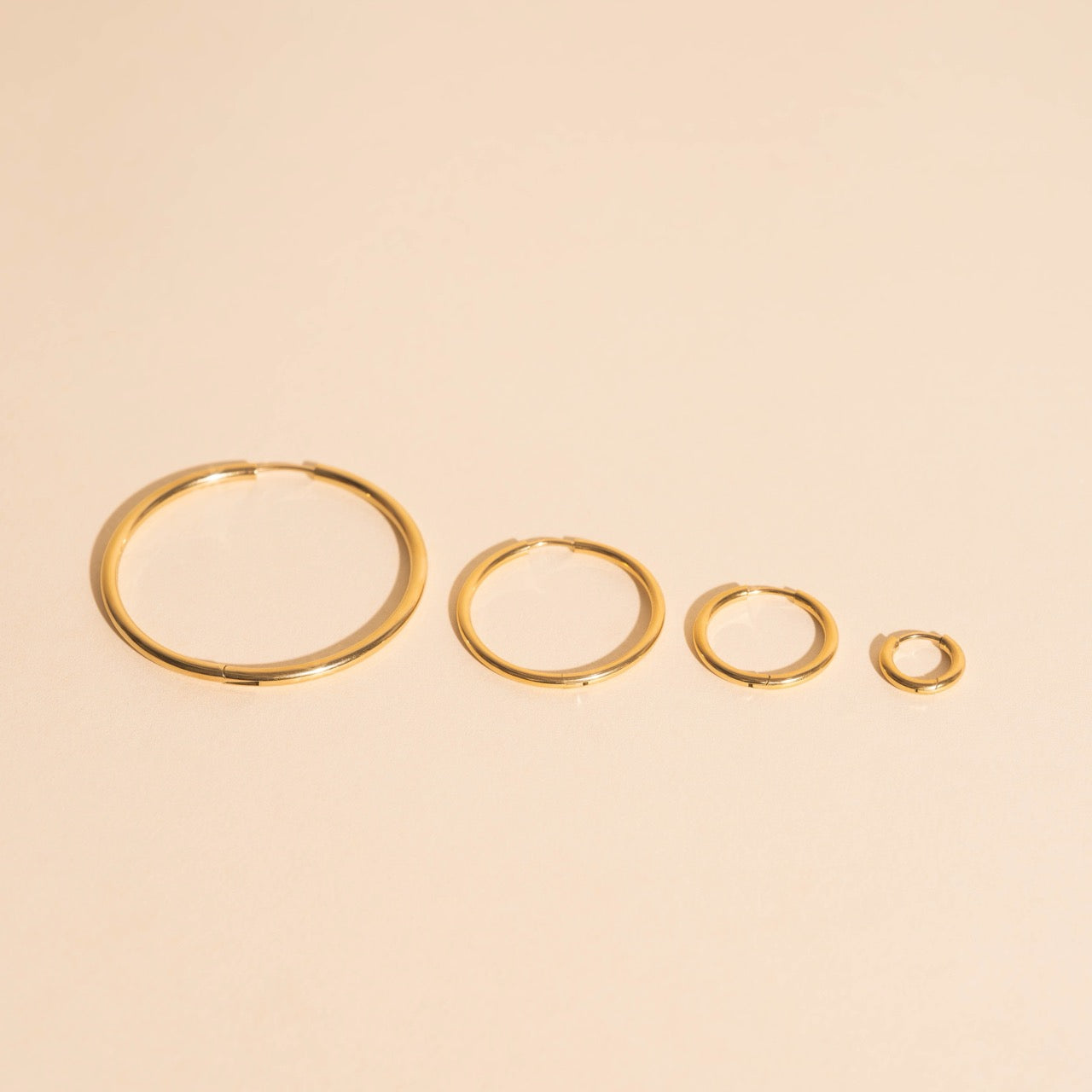 FeatherTUFF™ Circle Hoop Earrings 4-pack