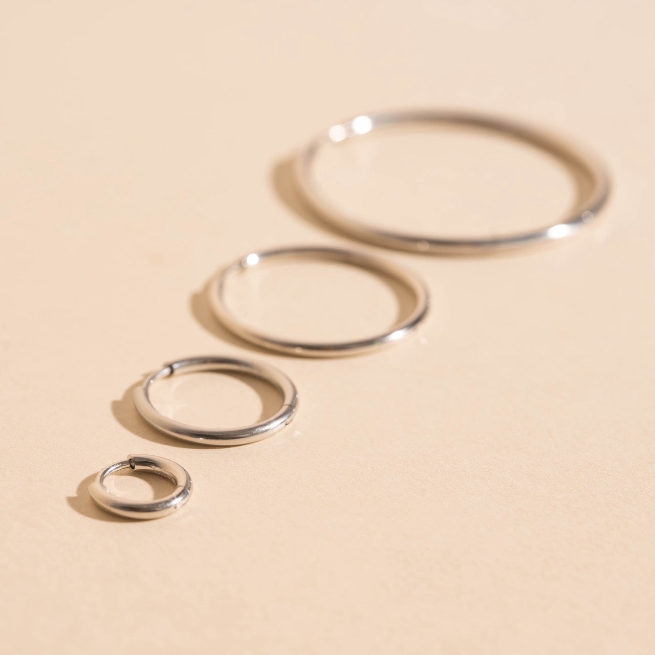 FeatherTUFF™ Circle Hoop Earrings 4-pack
