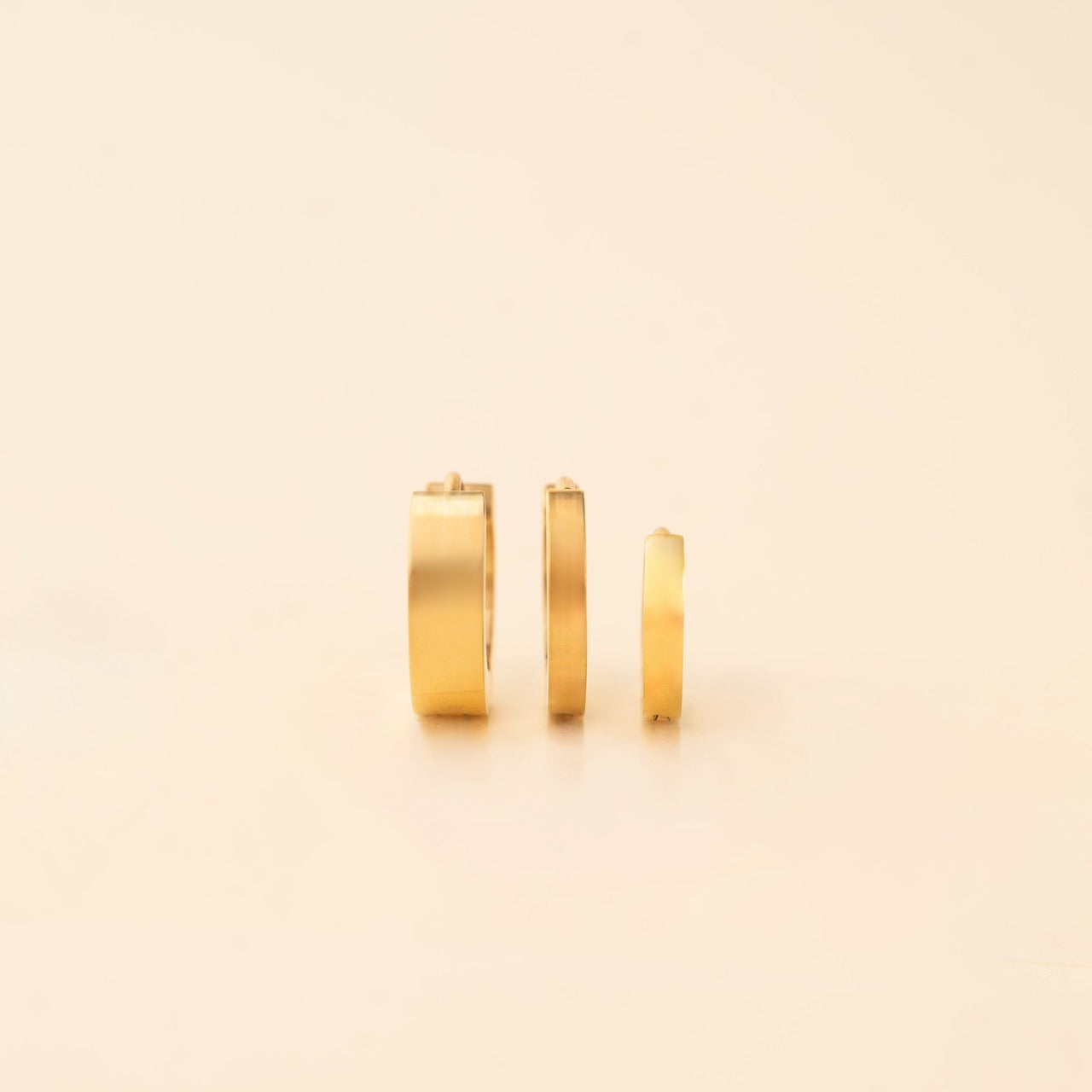 Smooth Tiny Huggie Hoop Earrings