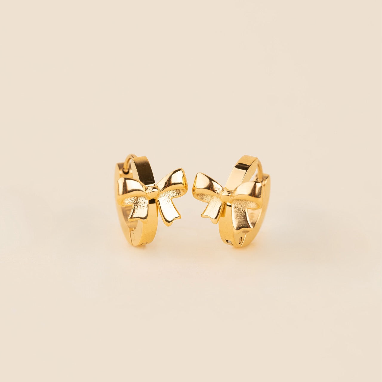 Bow 3D Huggie Hoop Earrings