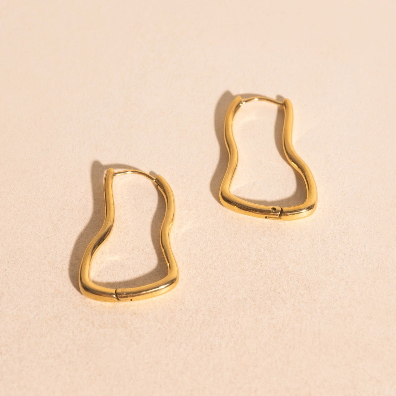 Cosmic Wave Rounded Huggie Hoop Earrings
