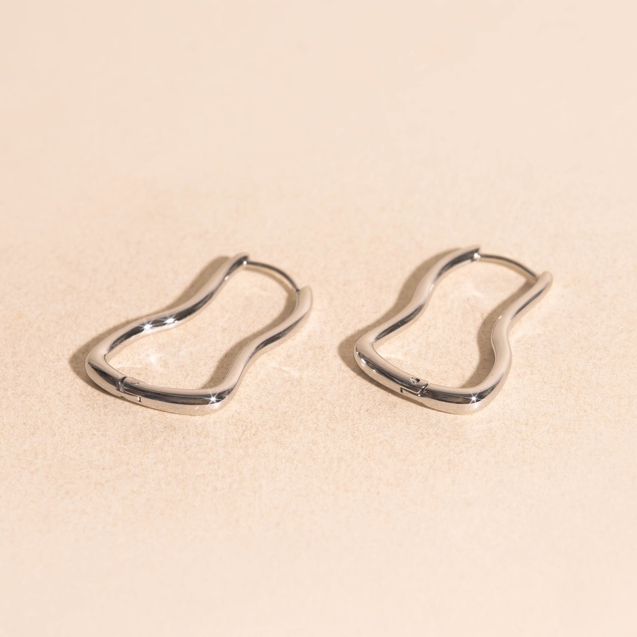 Cosmic Wave Rounded Huggie Hoop Earrings