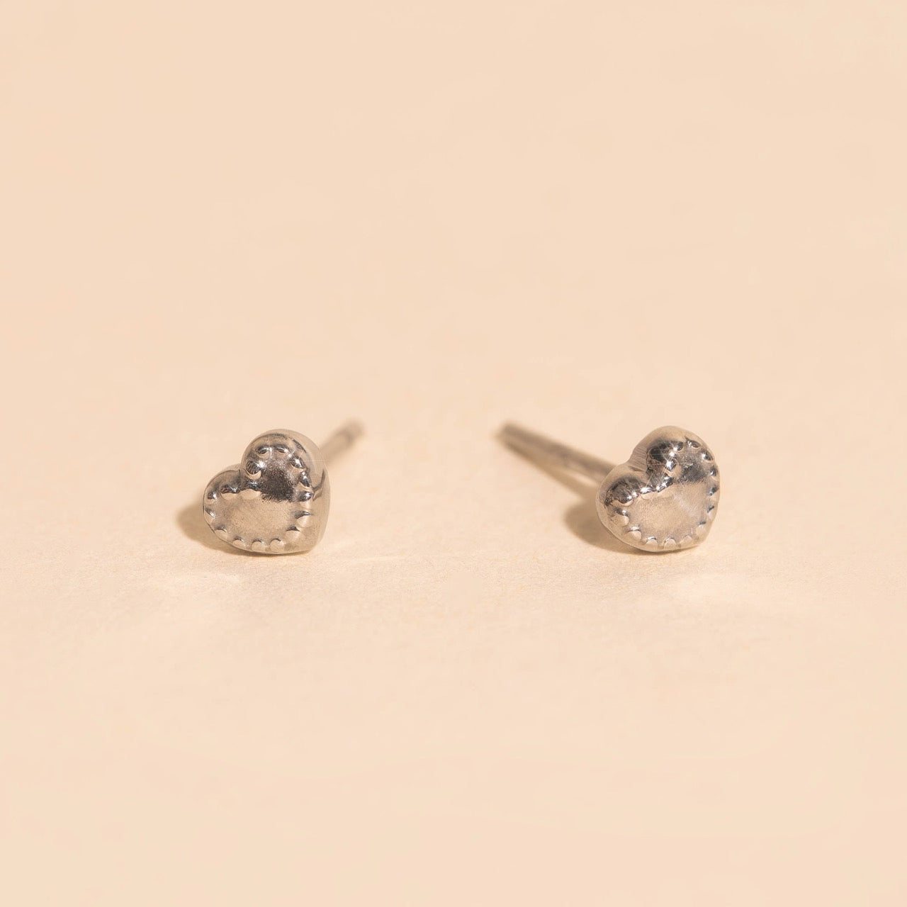 Tiny Heart Stitch Stud Earrings