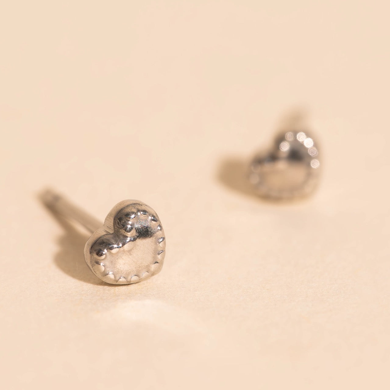 Tiny Heart Stitch Stud Earrings